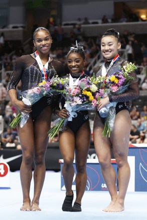 Simone Biles (C) wins first place, Shilese Jones (L) wins second place and Leanne Wong (R) wins third place in the US Gymnastics Championships overall, women's day two at SAP Center in San Jose, California, USA, August 27, 2023. US Gymnastics Championships, San Jose, USA - August 27, 2023